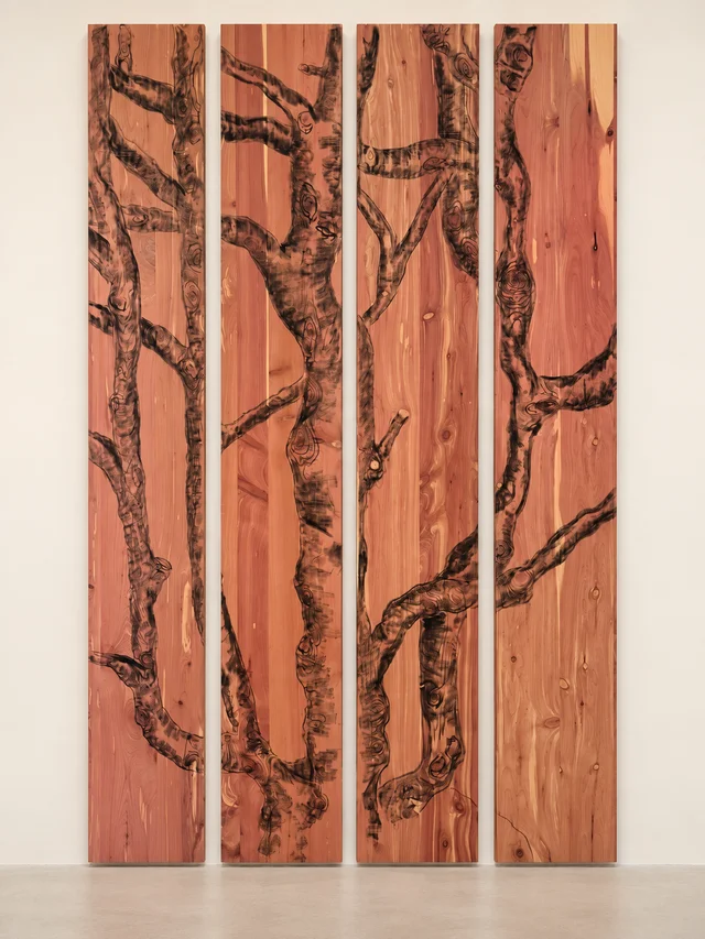 Four reddish wood panels with a continuous charcoal tree drawing
